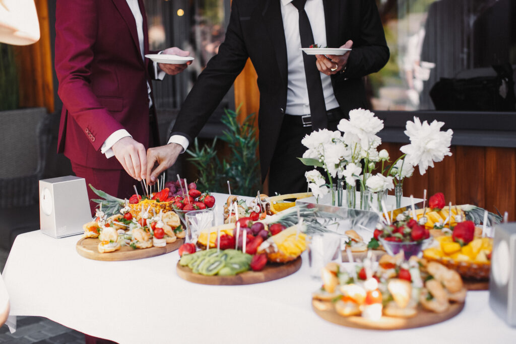 Professional catering setup with gourmet dishes at an elegant Abu Dhabi event