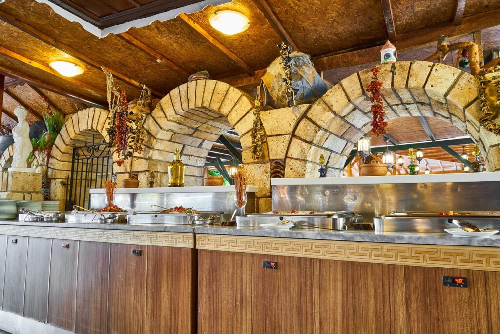 Elegant luxury catering setup with beautifully plated cuisine at an Abu Dhabi event