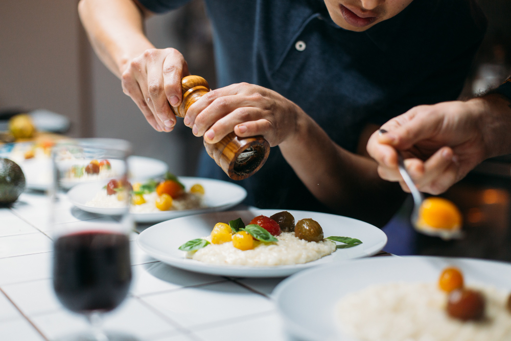 Modern food catering in Abu Dhabi with interactive live cooking station at an event