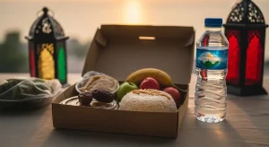 Iftar food box with dates, main course, soup and Ramadan drink prepared for Ramadan catering in Dubai